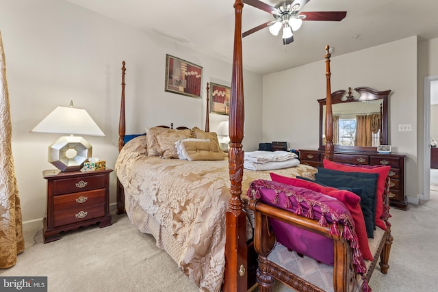 bedroom with light colored carpet and ceiling fan