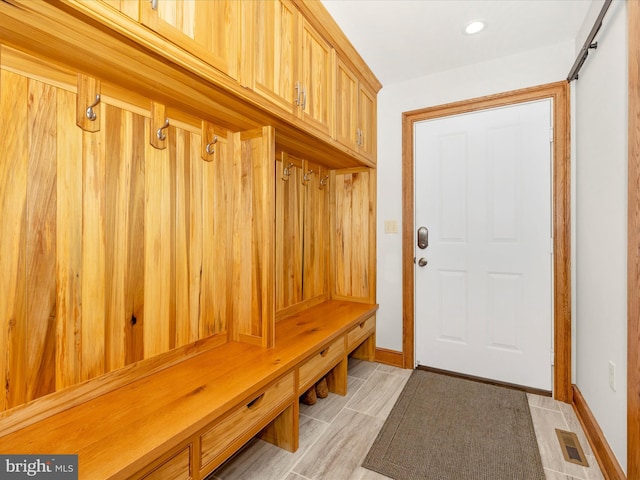 mudroom featuring light hardwood / wood-style flooring