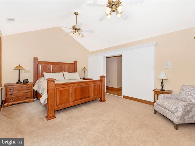 bedroom with ceiling fan, light carpet, and high vaulted ceiling