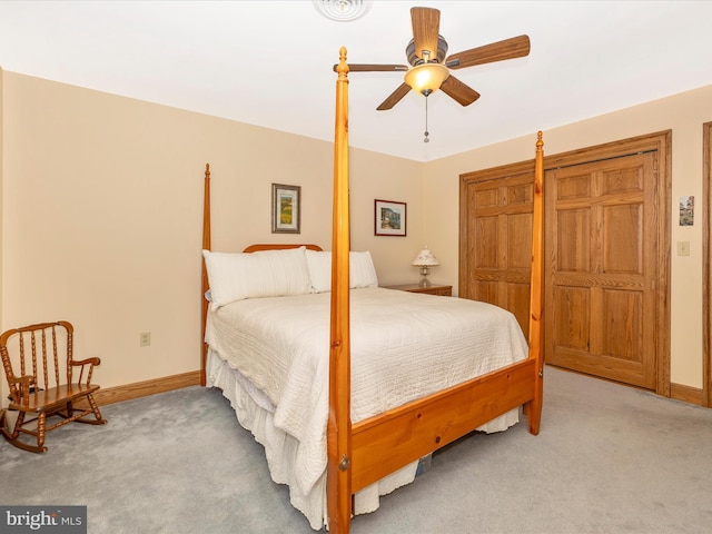 carpeted bedroom with ceiling fan