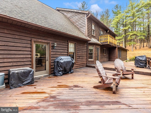 wooden deck with grilling area