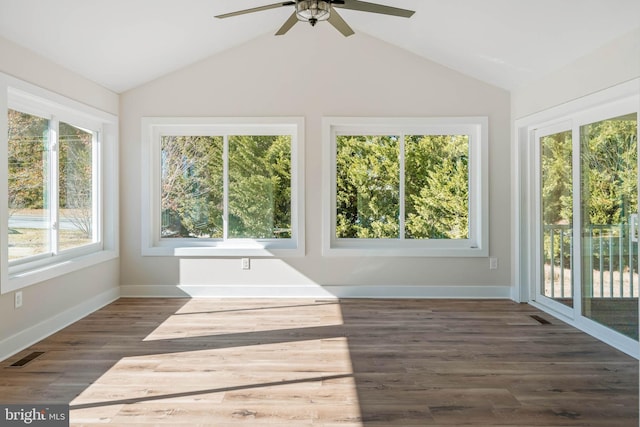 sunroom / solarium with ceiling fan and lofted ceiling