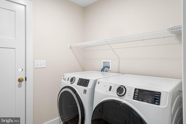 laundry area featuring washer and clothes dryer