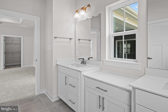 bathroom with vanity and tile patterned floors