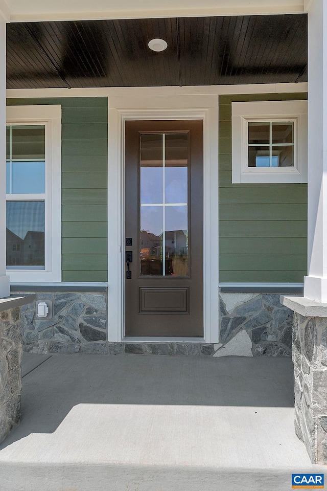 property entrance with a porch