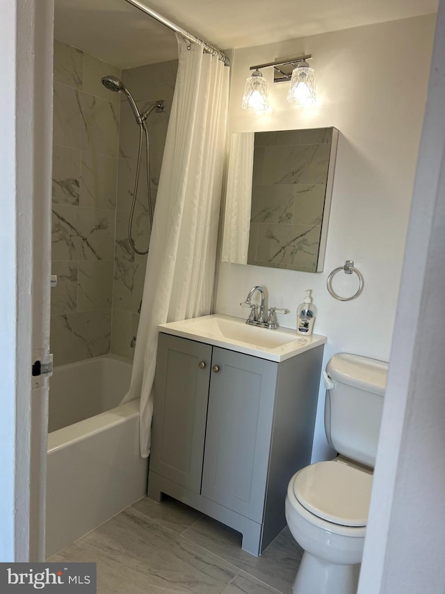 full bathroom with toilet, vanity, and shower / tub combo with curtain