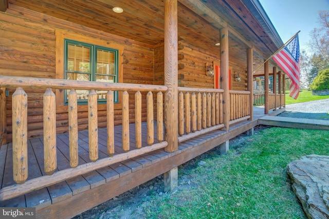 view of property exterior with a porch