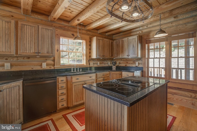 kitchen featuring hanging light fixtures, stainless steel dishwasher, a center island, and log walls