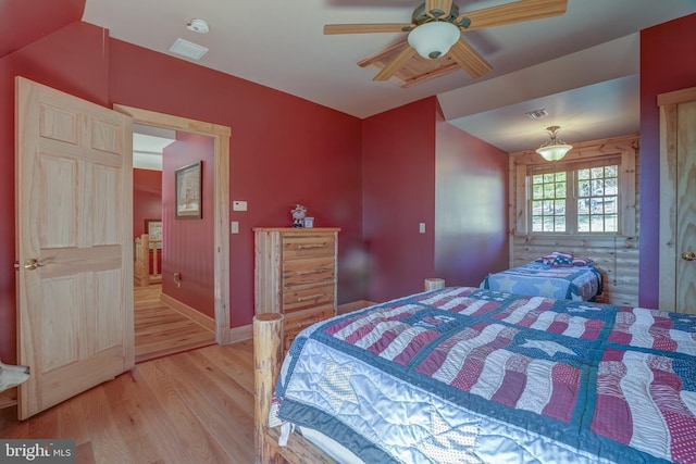 bedroom featuring ceiling fan and wood-type flooring