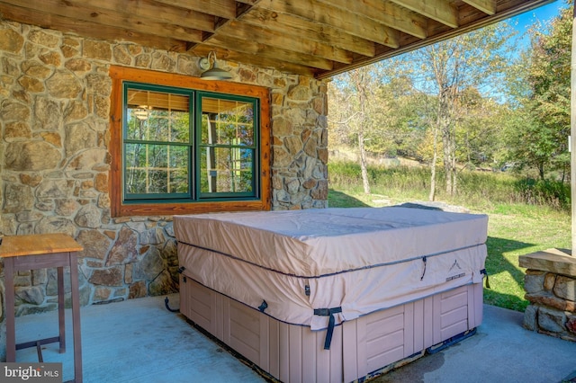 view of patio / terrace featuring a hot tub