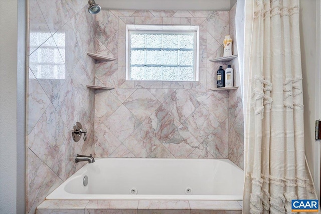 bathroom with shower / bath combo with shower curtain