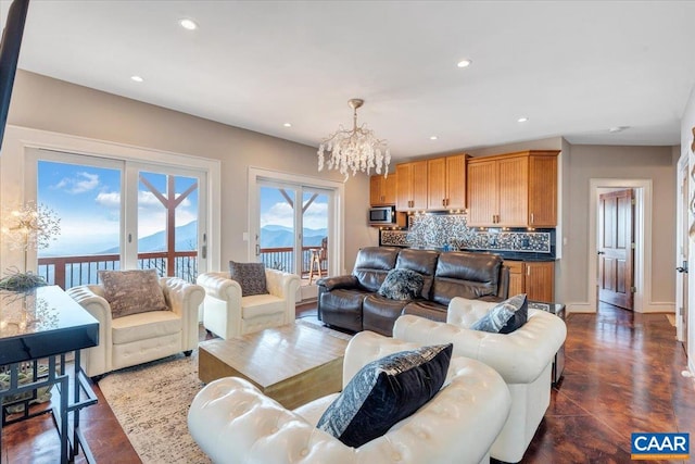 living room featuring an inviting chandelier