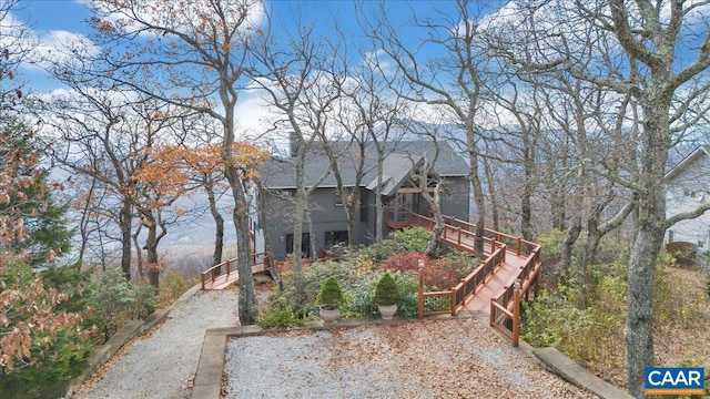 view of yard featuring a wooden deck