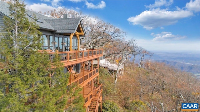 view of yard featuring a wooden deck