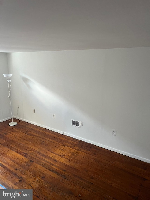 interior space with dark wood-type flooring