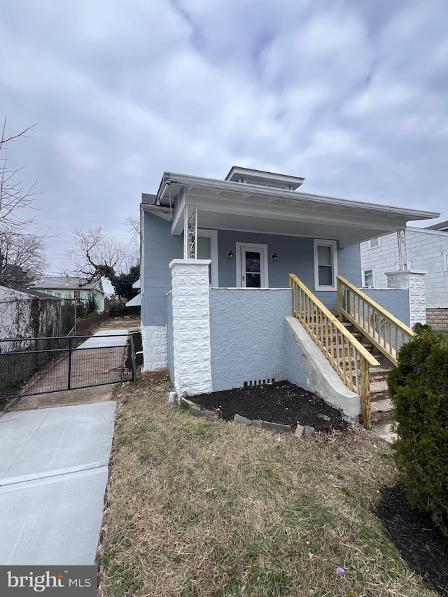 view of home's exterior with covered porch