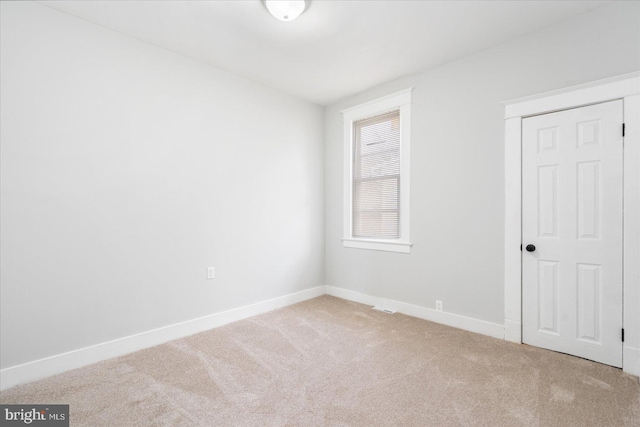 empty room with carpet floors