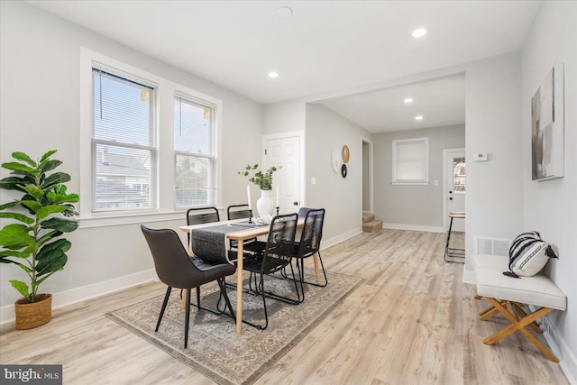 dining area with light wood-type flooring