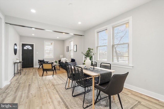 dining room featuring light hardwood / wood-style flooring