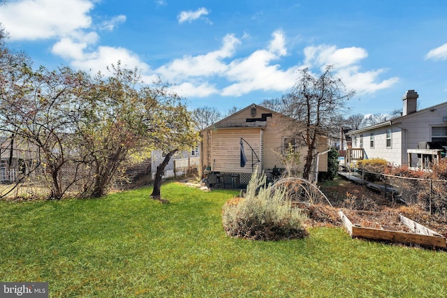 view of property exterior featuring a lawn