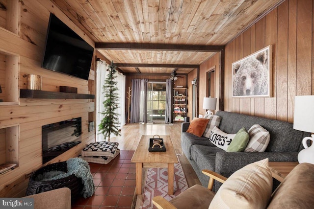 living room featuring wood walls, dark hardwood / wood-style flooring, beamed ceiling, and wooden ceiling