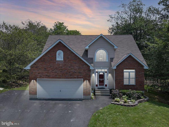 view of front of property with a yard