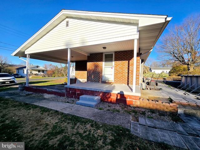 view of patio featuring a carport