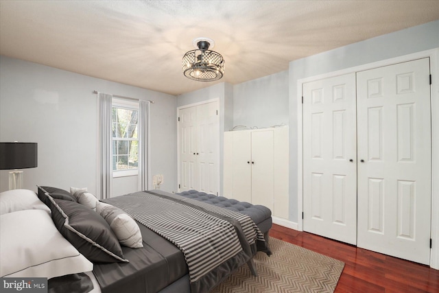 bedroom featuring wood finished floors