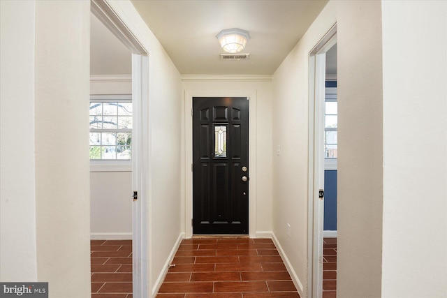 doorway with dark hardwood / wood-style flooring