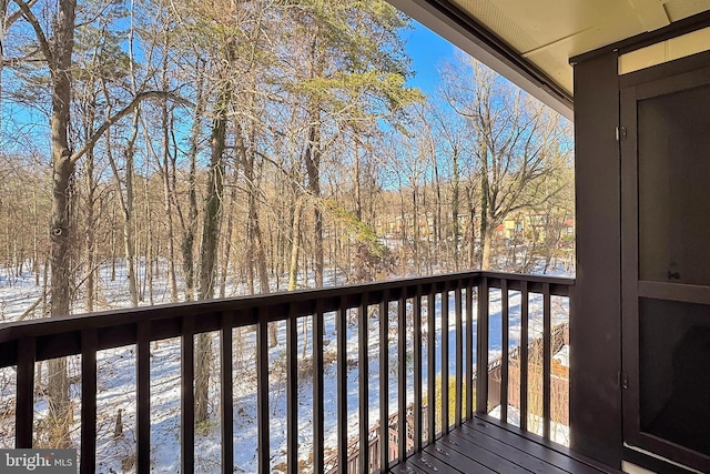 view of snow covered deck