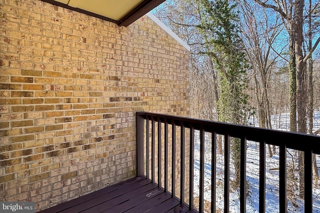 view of snow covered deck