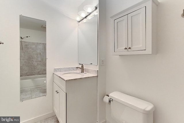 full bathroom featuring toilet, vanity, and shower / bathing tub combination