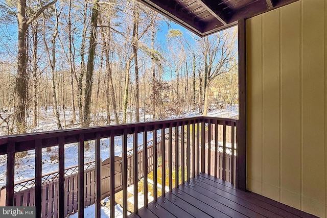 view of snow covered deck