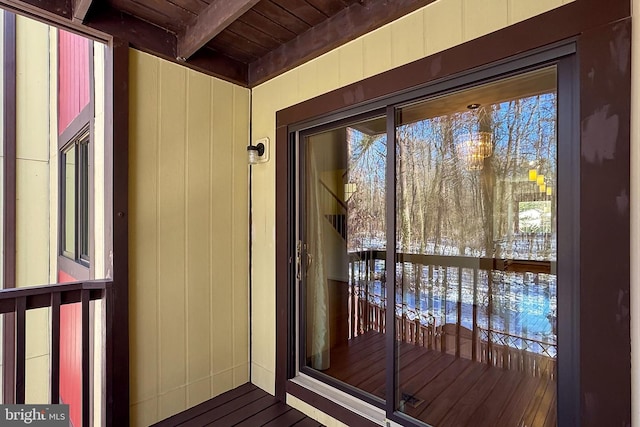 view of snow covered property entrance