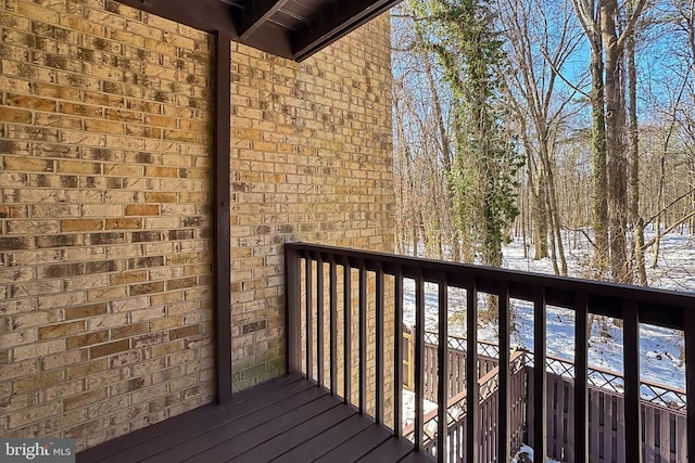 view of snow covered deck