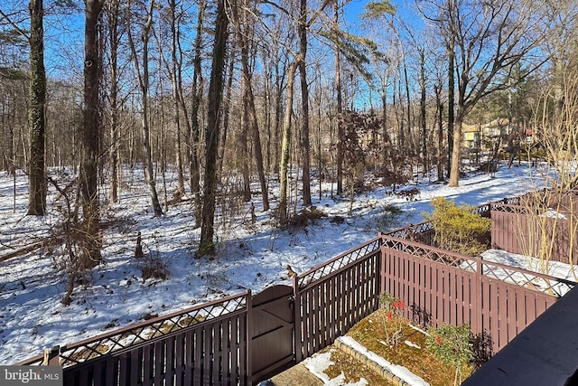 view of snow covered deck