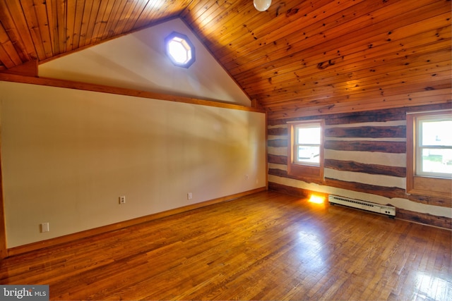 additional living space with wooden ceiling, wood-type flooring, a healthy amount of sunlight, and lofted ceiling