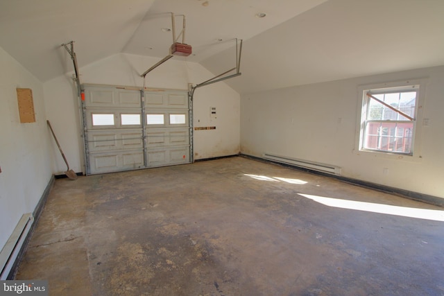 garage featuring a garage door opener and a baseboard heating unit