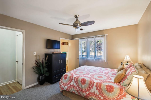 bedroom with hardwood / wood-style flooring and ceiling fan