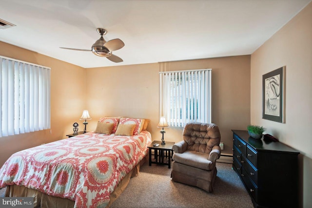 bedroom featuring carpet flooring, a baseboard radiator, and ceiling fan