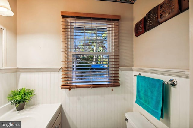 8388 Hilda Dr, Salisbury, MD 21804 - half bath featuring toilet, a wainscoted wall, and vanity