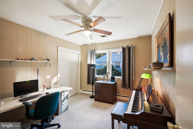 home office featuring ceiling fan, light carpet, ornamental molding, and a baseboard radiator