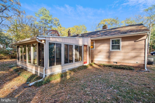 8388 Hilda Dr, Salisbury, MD 21804 - rear view of house with a sunroom, a chimney, and crawl space