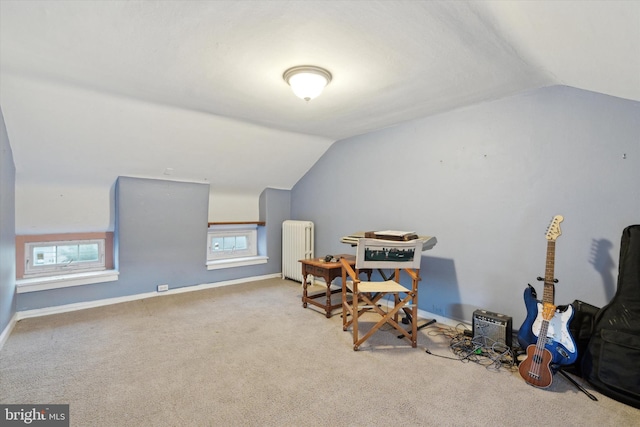 bonus room with light colored carpet, lofted ceiling, a healthy amount of sunlight, and radiator