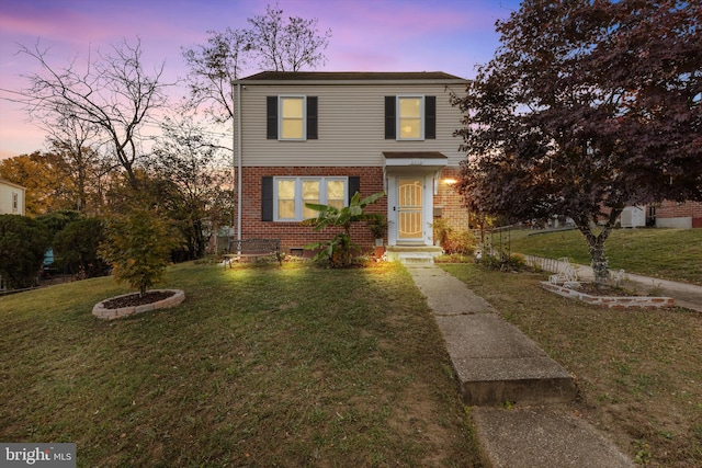 view of front property with a lawn