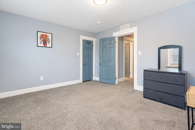 unfurnished bedroom with carpet flooring