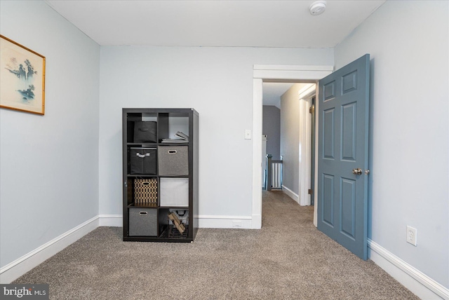 unfurnished bedroom with carpet