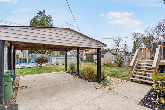 view of patio / terrace featuring a fenced in pool