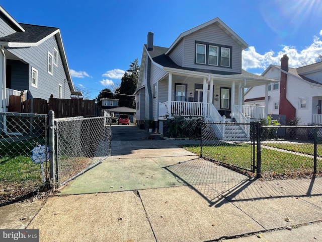 bungalow with a front lawn and a porch