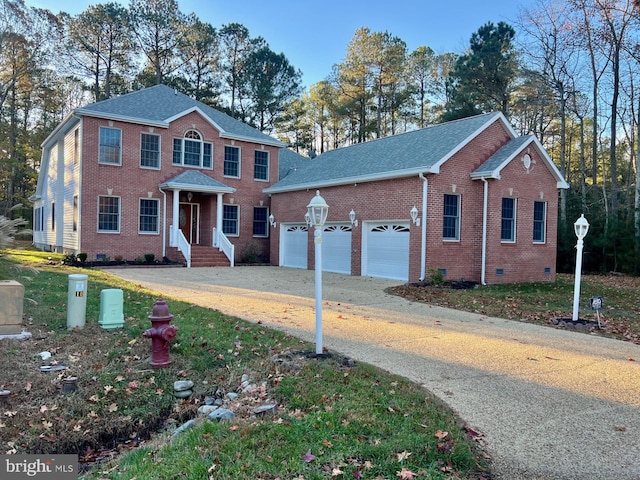 view of front of house with a garage